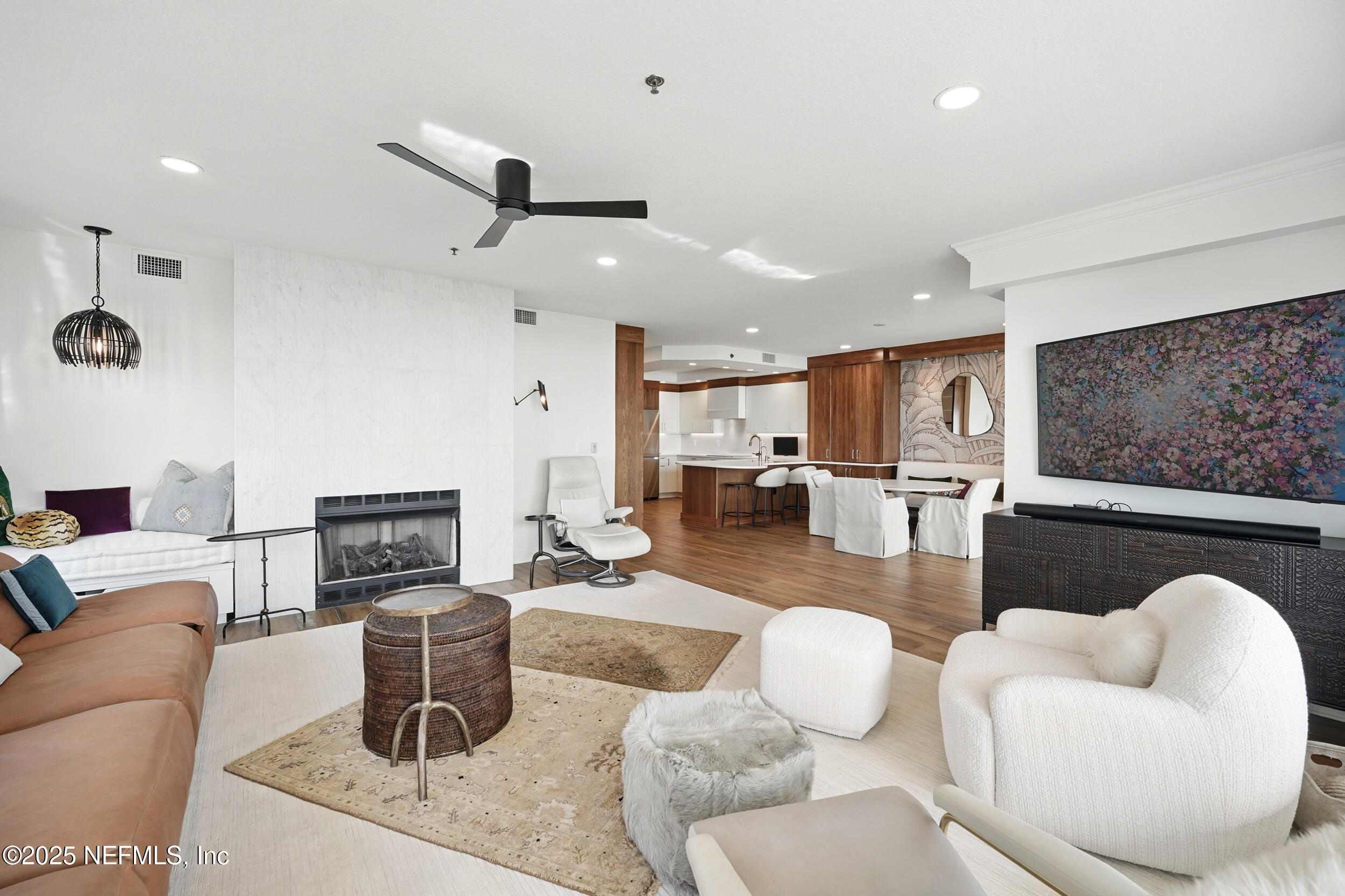 1505 1st Street South, Unit 302 Jacksonville Beach, FL 32250 - Photo 18 of 57 a living room with furniture and kitchen view