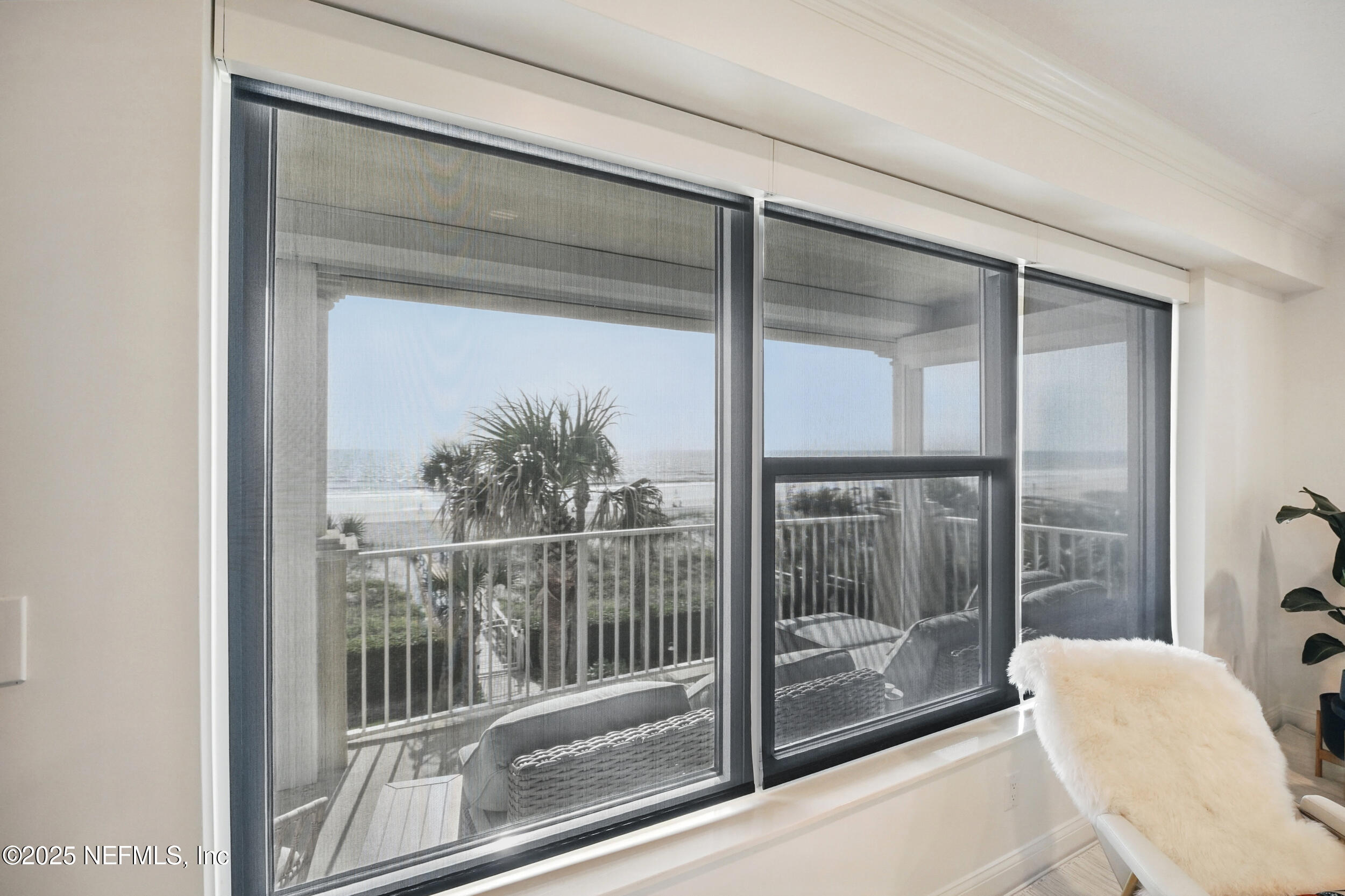 1505 1st Street South, Unit 302 Jacksonville Beach, FL 32250 - Photo 25 of 57 a view of a glass door with a glass door