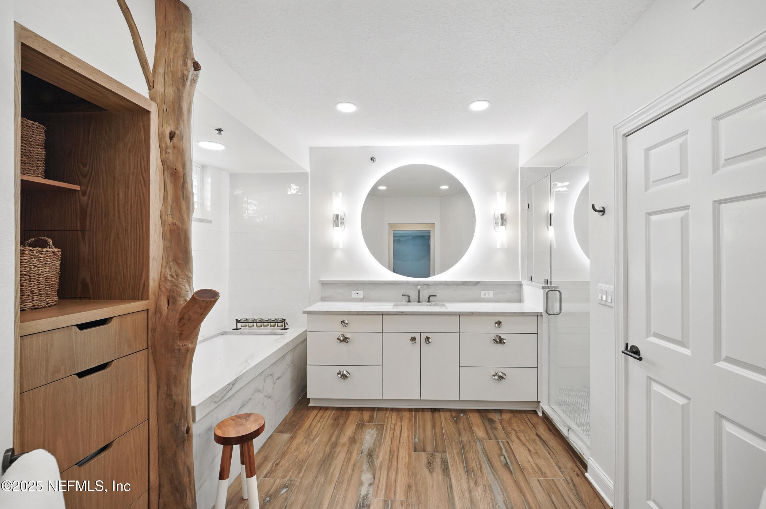 1505 1st Street South, Unit 302 Jacksonville Beach, FL 32250 - Photo 29 of 57 a bathroom with a granite countertop sink mirror and vanity