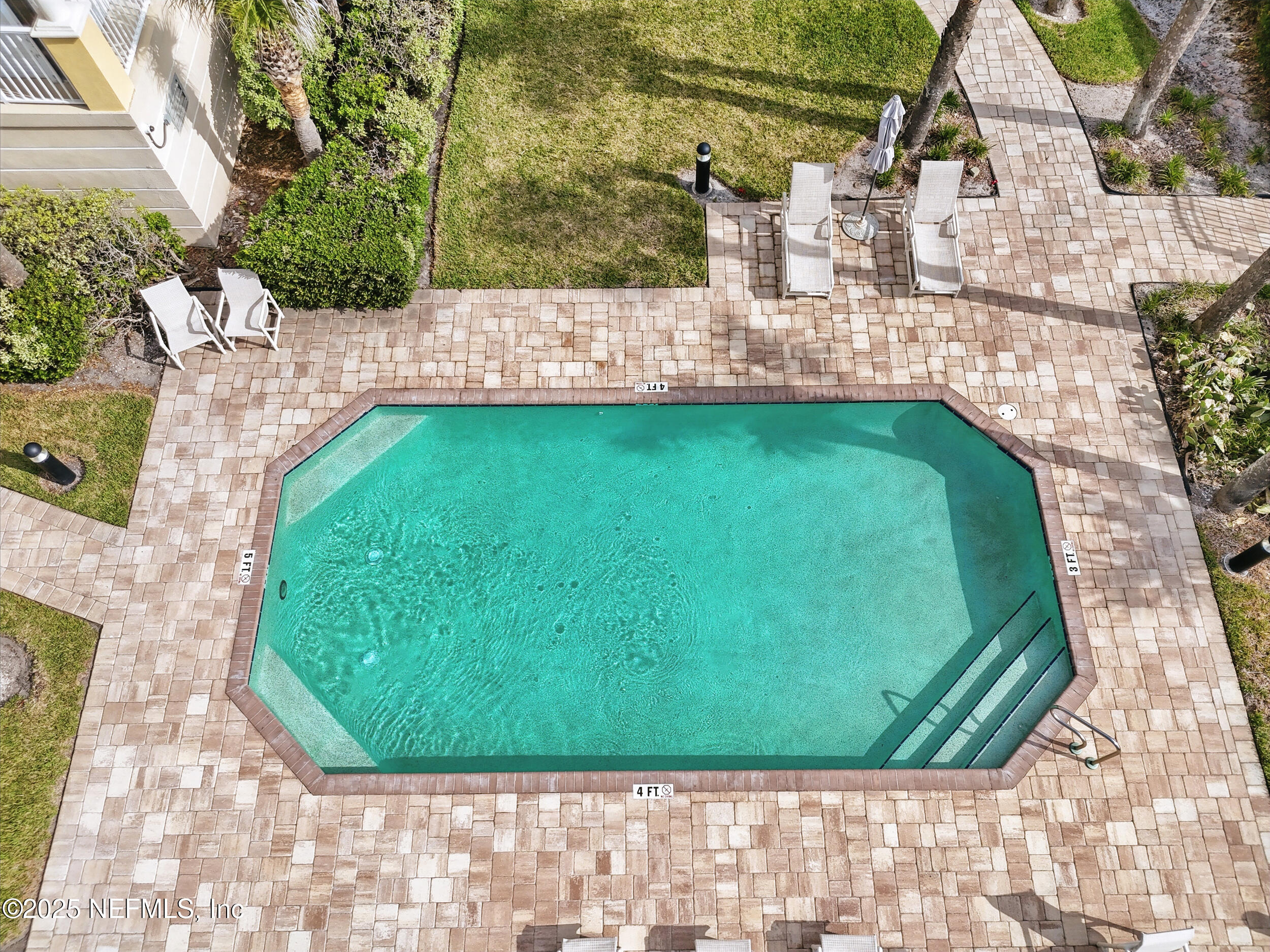 1505 1st Street South, Unit 302 Jacksonville Beach, FL 32250 - Photo 50 of 57 a view of a back yard of the house