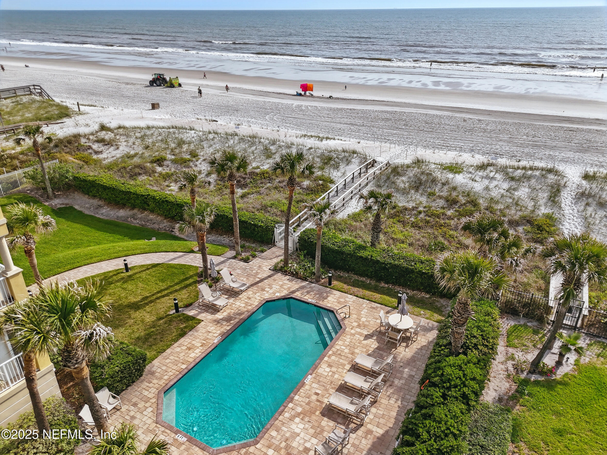 1505 1st Street South, Unit 302 Jacksonville Beach, FL 32250 - Photo 51 of 57 a view of a yard with an outdoor space