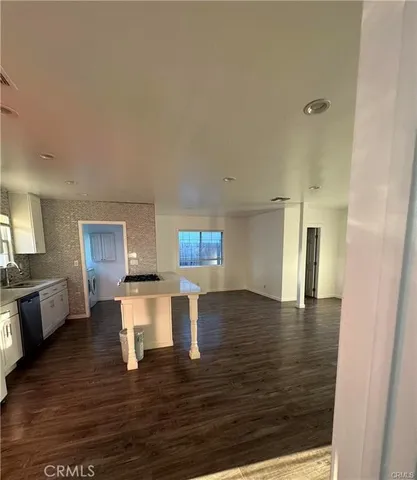 a view of a livingroom with a ceiling fan