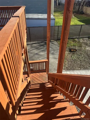 a balcony view with a garden
