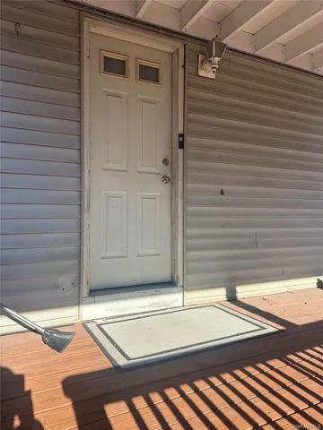 a view of a backyard of the house