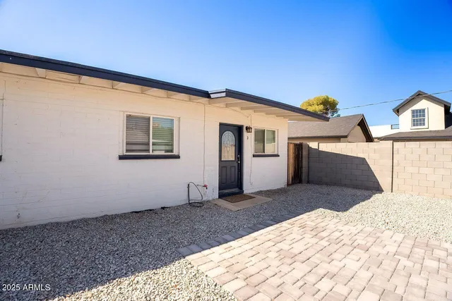 a front view of a house with a porch