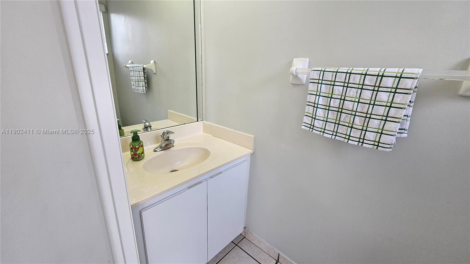 8079 Northwest 8th Street, Unit 9 Miami, FL 33126 - Photo 9 of 42 Half bath on first floor