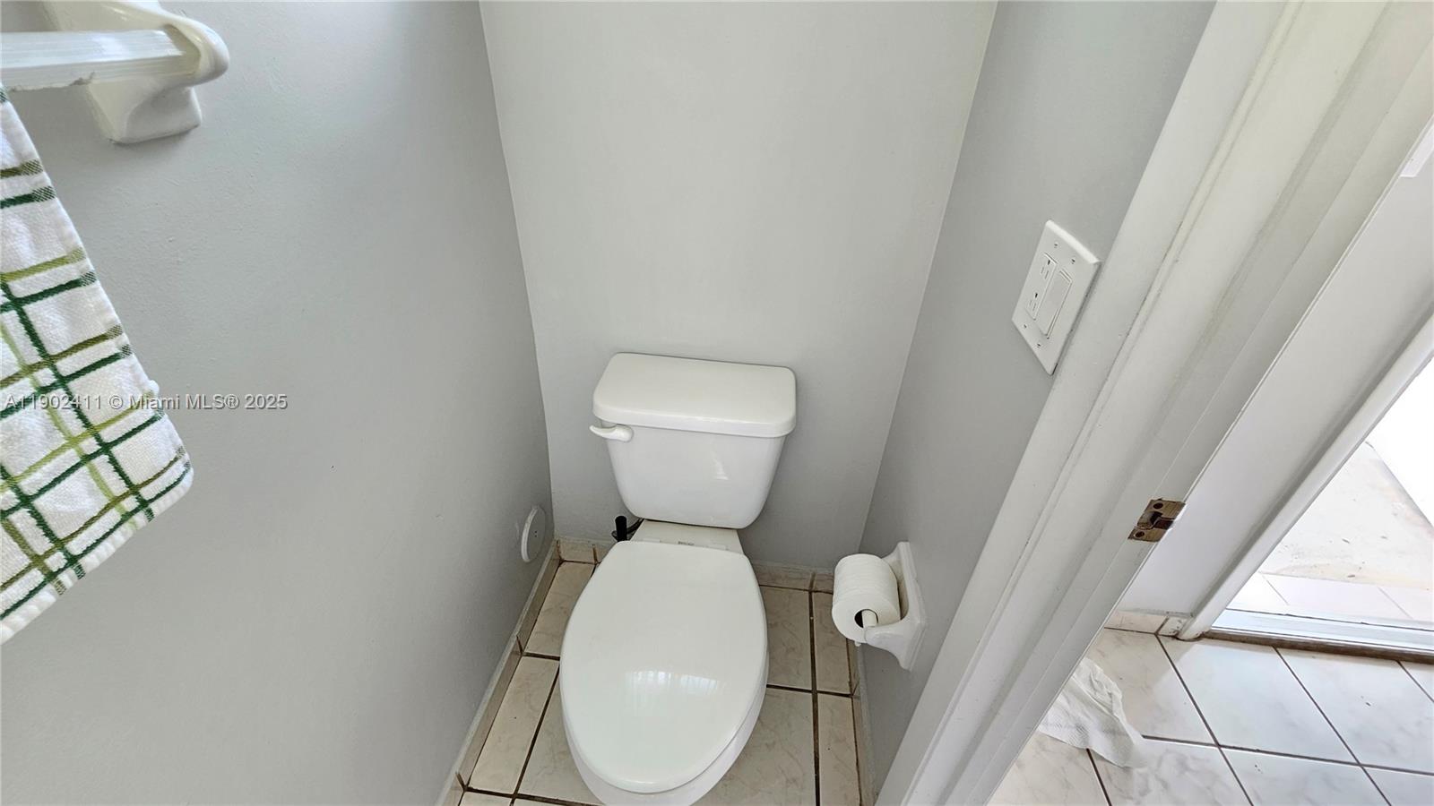 8079 Northwest 8th Street, Unit 9 Miami, FL 33126 - Photo 10 of 42 Half bath on first floor