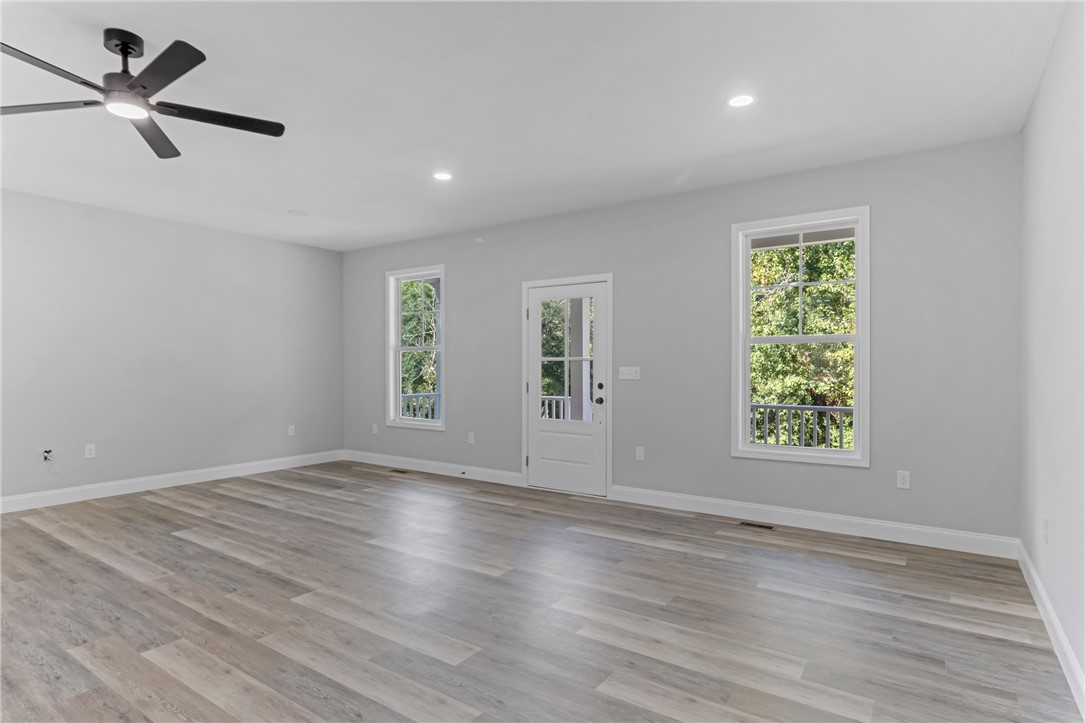 1115 Marshall Road Anderson, SC 29626 - Photo 6 of 35 Recessed lighting and durable hard-surface flooring span this versatile open-concept living space.