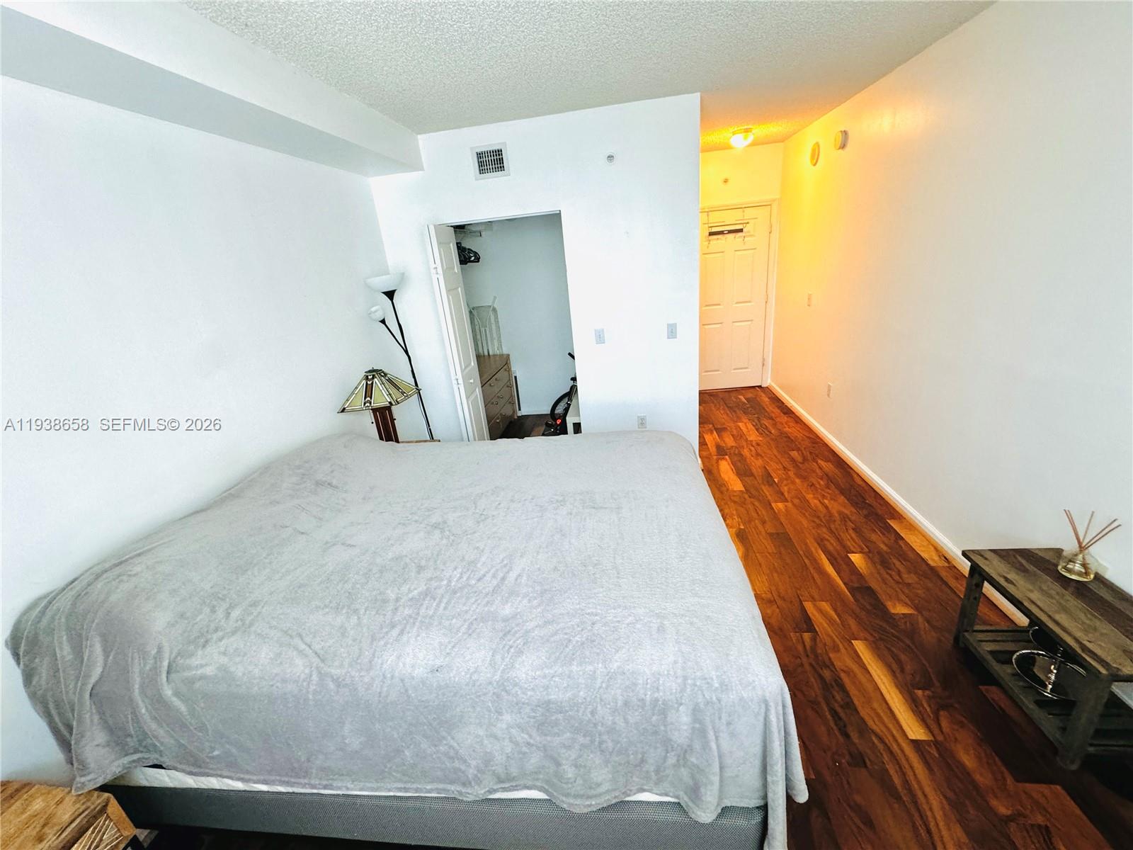 17150 North Bay Road, Unit 2412 Sunny Isles Beach, FL 33160 - Photo 12 of 29 a view of a wooden floor