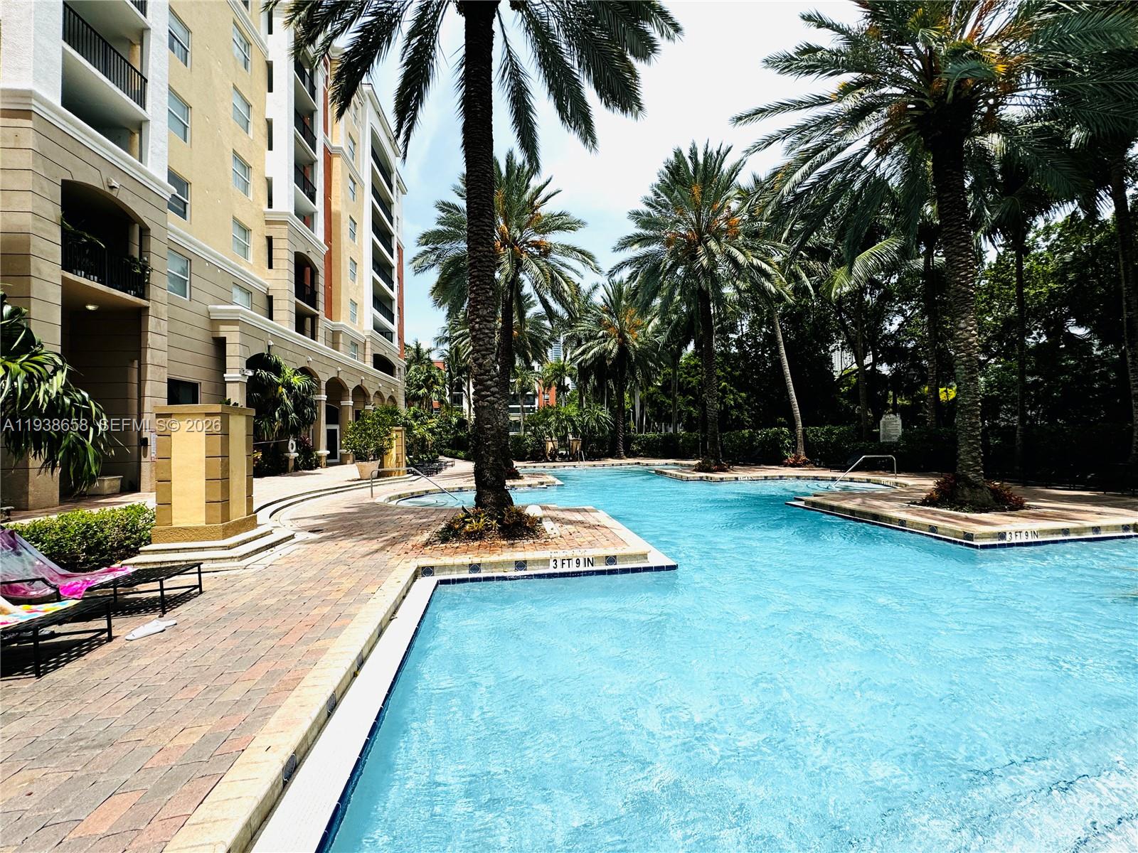 17150 North Bay Road, Unit 2412 Sunny Isles Beach, FL 33160 - Photo 18 of 25 a view of a park with swings and slides