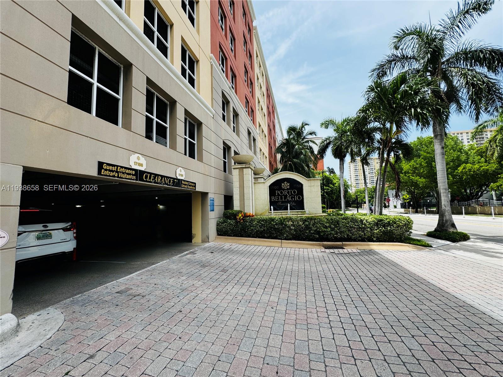 17150 North Bay Road, Unit 2412 Sunny Isles Beach, FL 33160 - Photo 28 of 29 a view of multiple houses with a yard
