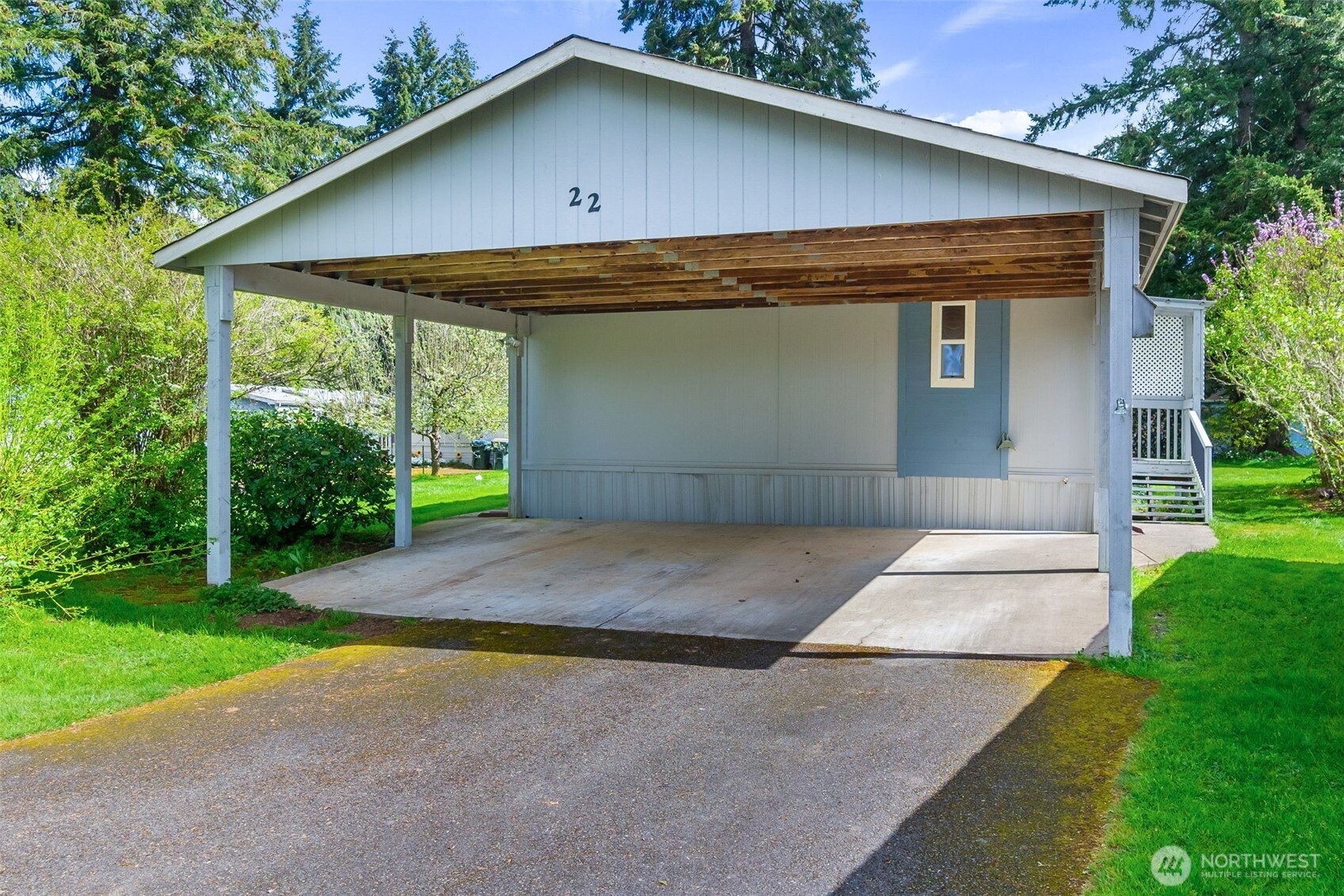 271 Romerman Road, Unit 22 Chehalis, WA 98532 - Photo 2 of 27 a front view of a house with garden