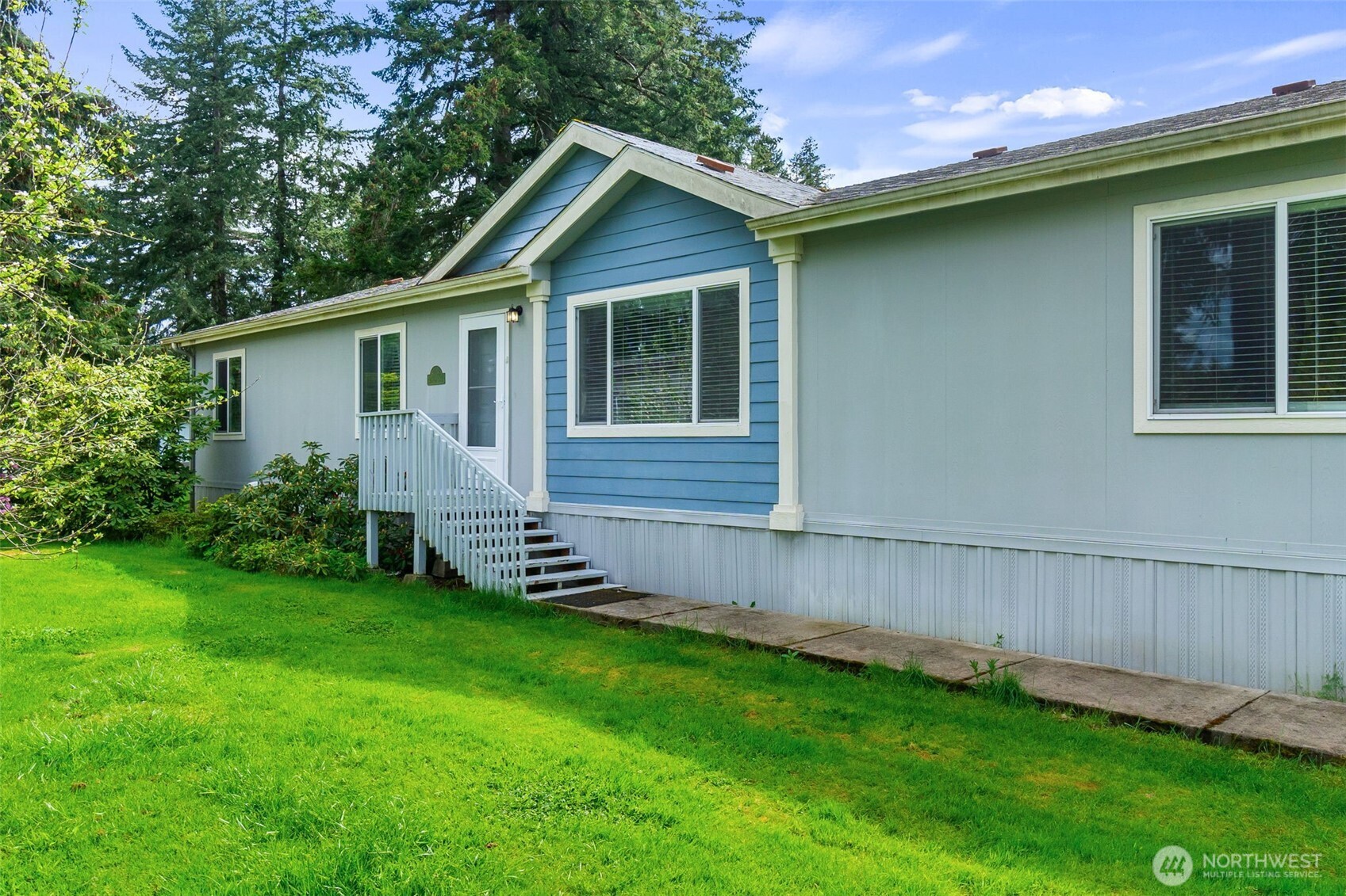 271 Romerman Road, Unit 22 Chehalis, WA 98532 - Photo 25 of 27 a view of a house with a backyard