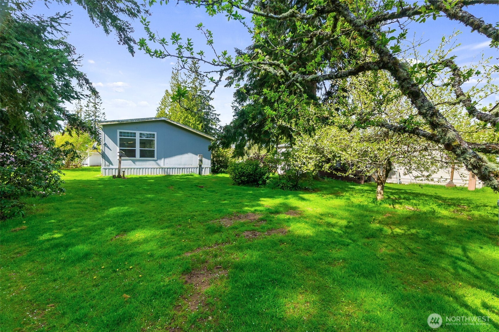 271 Romerman Road, Unit 22 Chehalis, WA 98532 - Photo 3 of 27 a view of a house with a yard