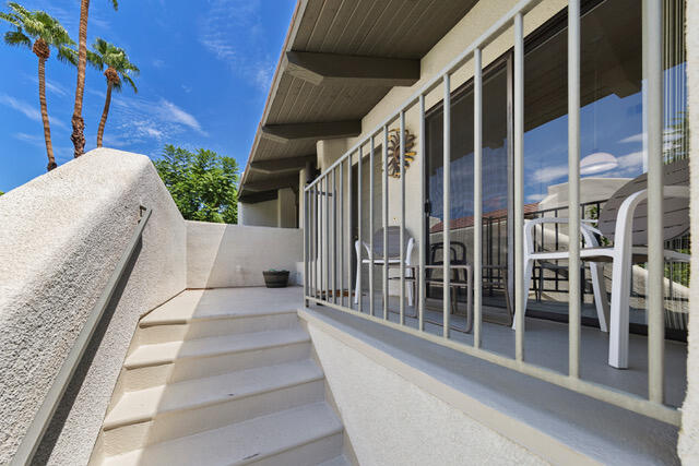 1150 East Amado Road, Unit 8A2 Palm Springs, CA 92262 - Photo 3 of 21 stairs to patio