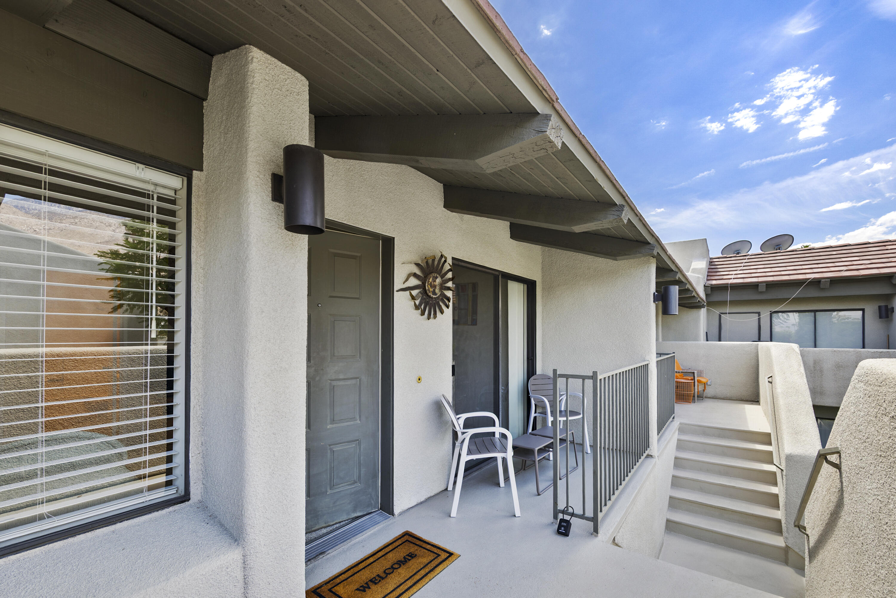 1150 East Amado Road, Unit 8A2 Palm Springs, CA 92262 - Photo 4 of 21 cozy patio