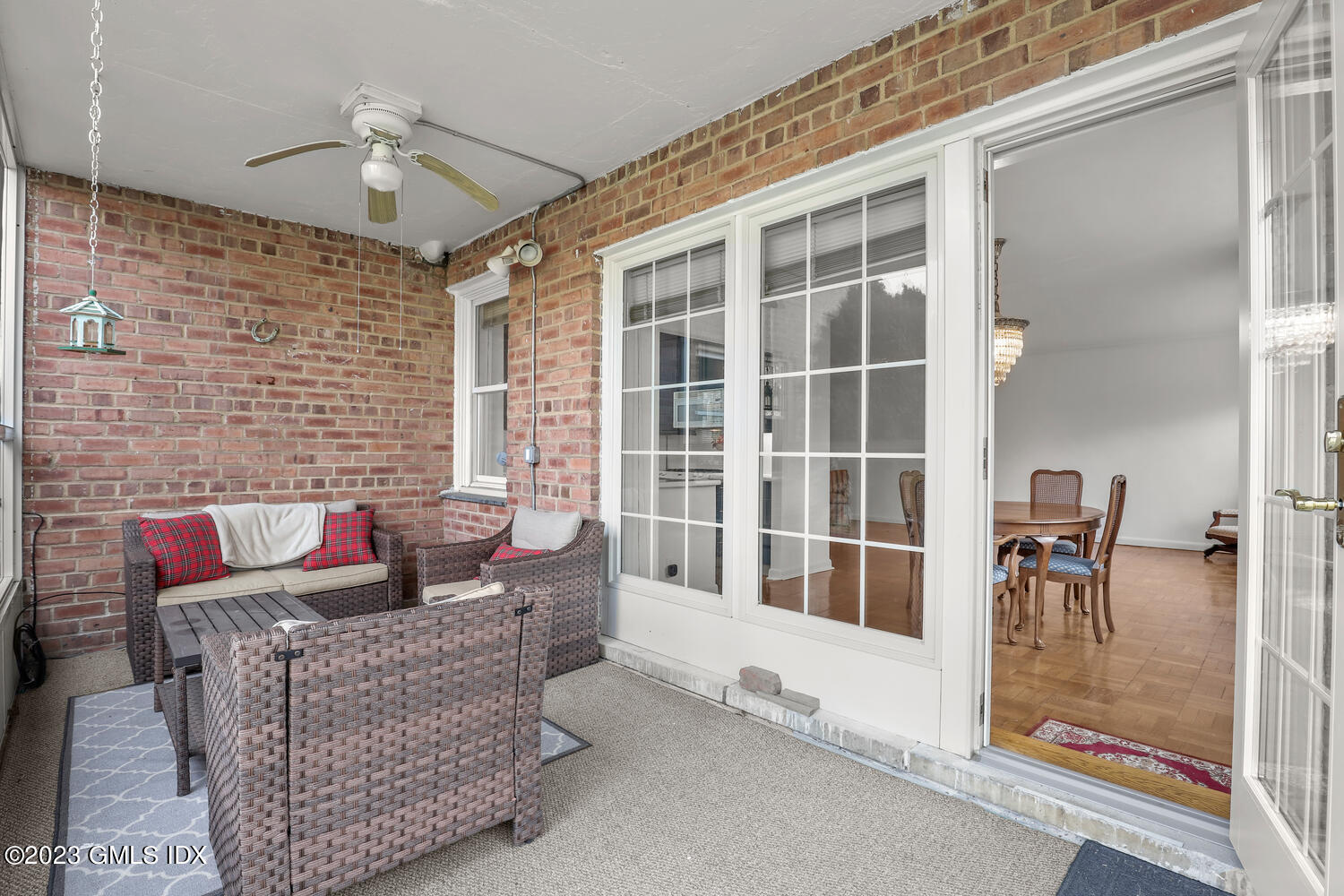 2 Putnam Hill, Unit 1C Greenwich, CT 06830 - Photo 12 of 13 a living room with furniture and a window