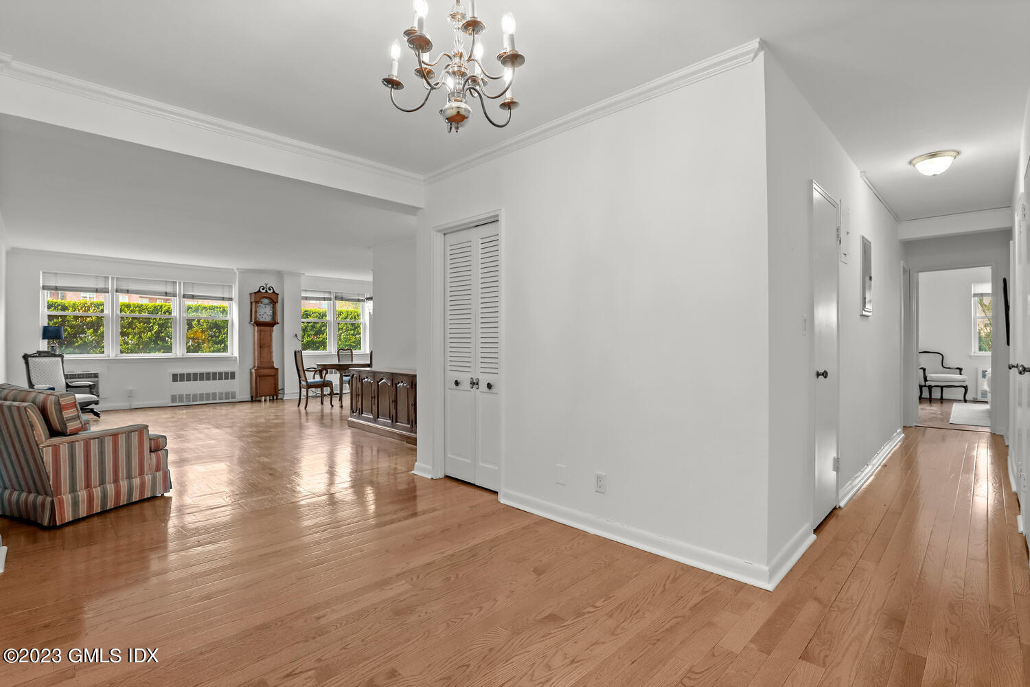 2 Putnam Hill, Unit 1C Greenwich, CT 06830 - Photo 3 of 13 a view of a livingroom with furniture hardwood floor and a large window