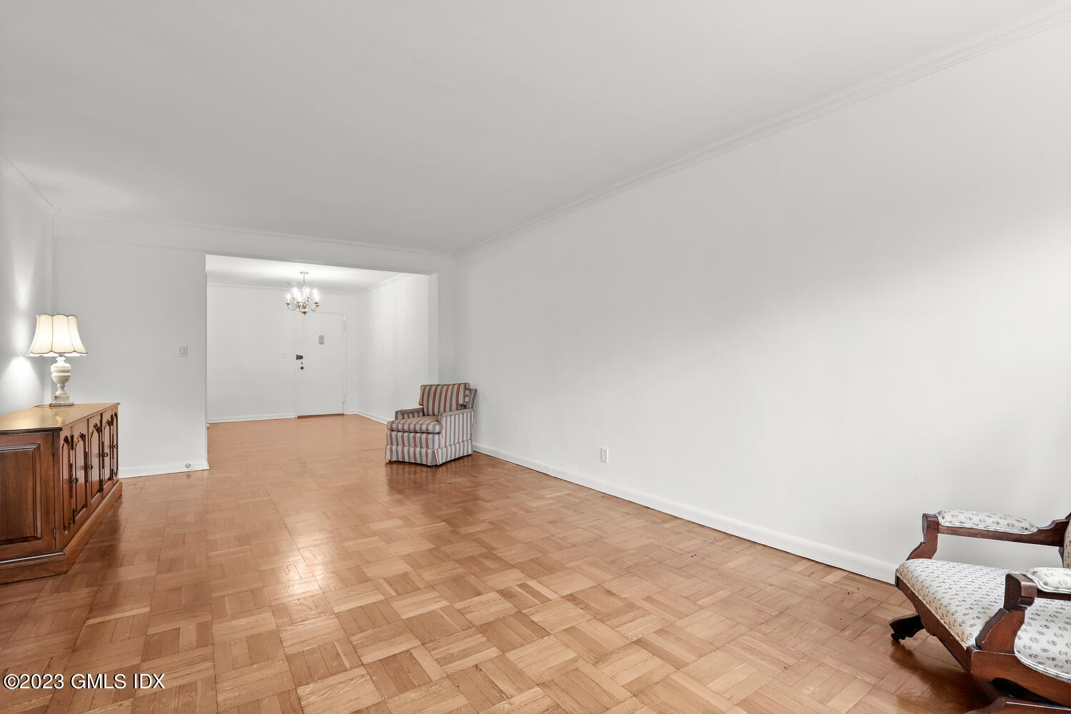 2 Putnam Hill, Unit 1C Greenwich, CT 06830 - Photo 4 of 13 a view of an empty room and kitchen
