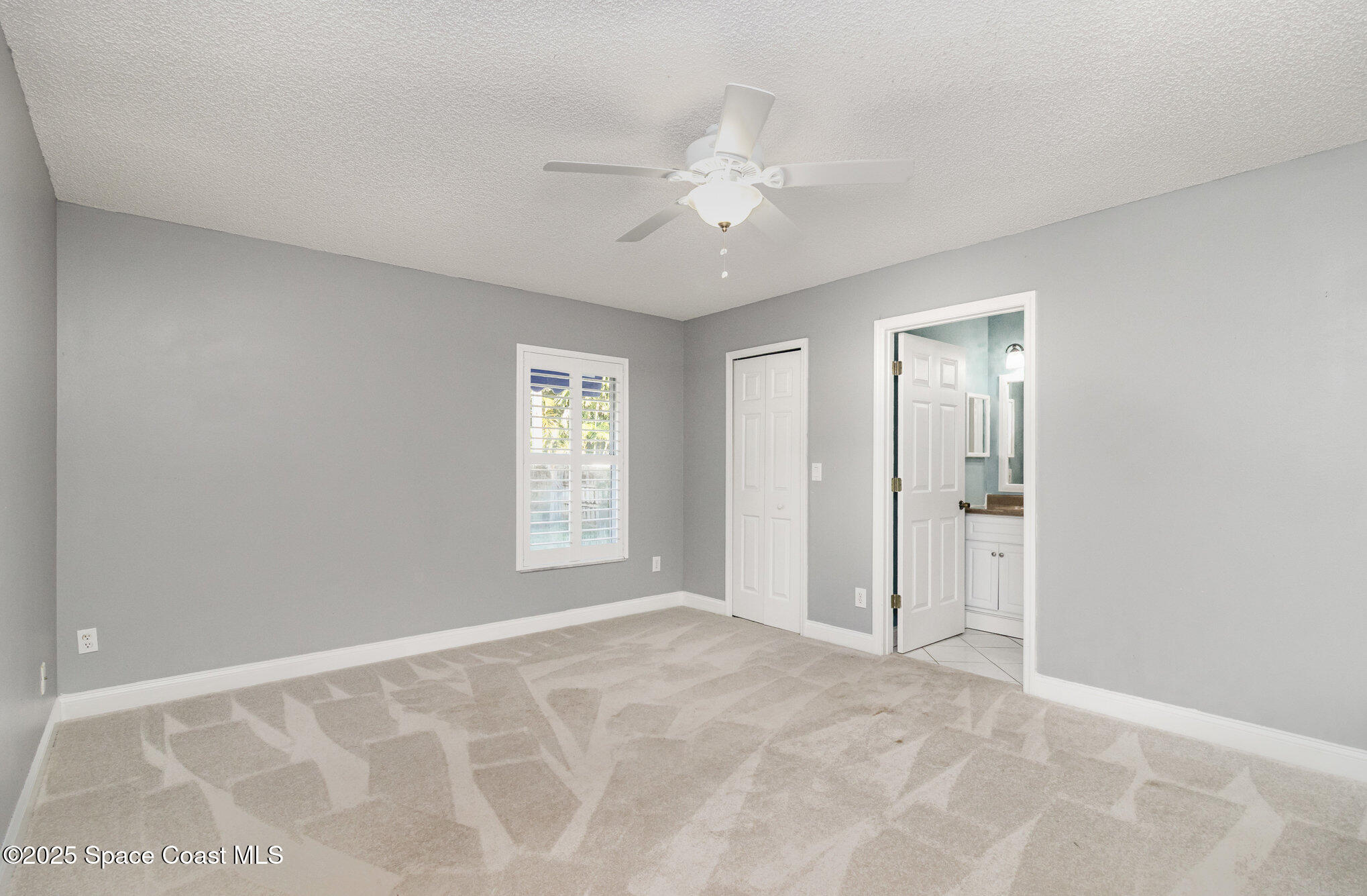 561 Carnival Terrace Sebastian, FL 32958 - Photo 10 of 28 a view of an empty room with a window