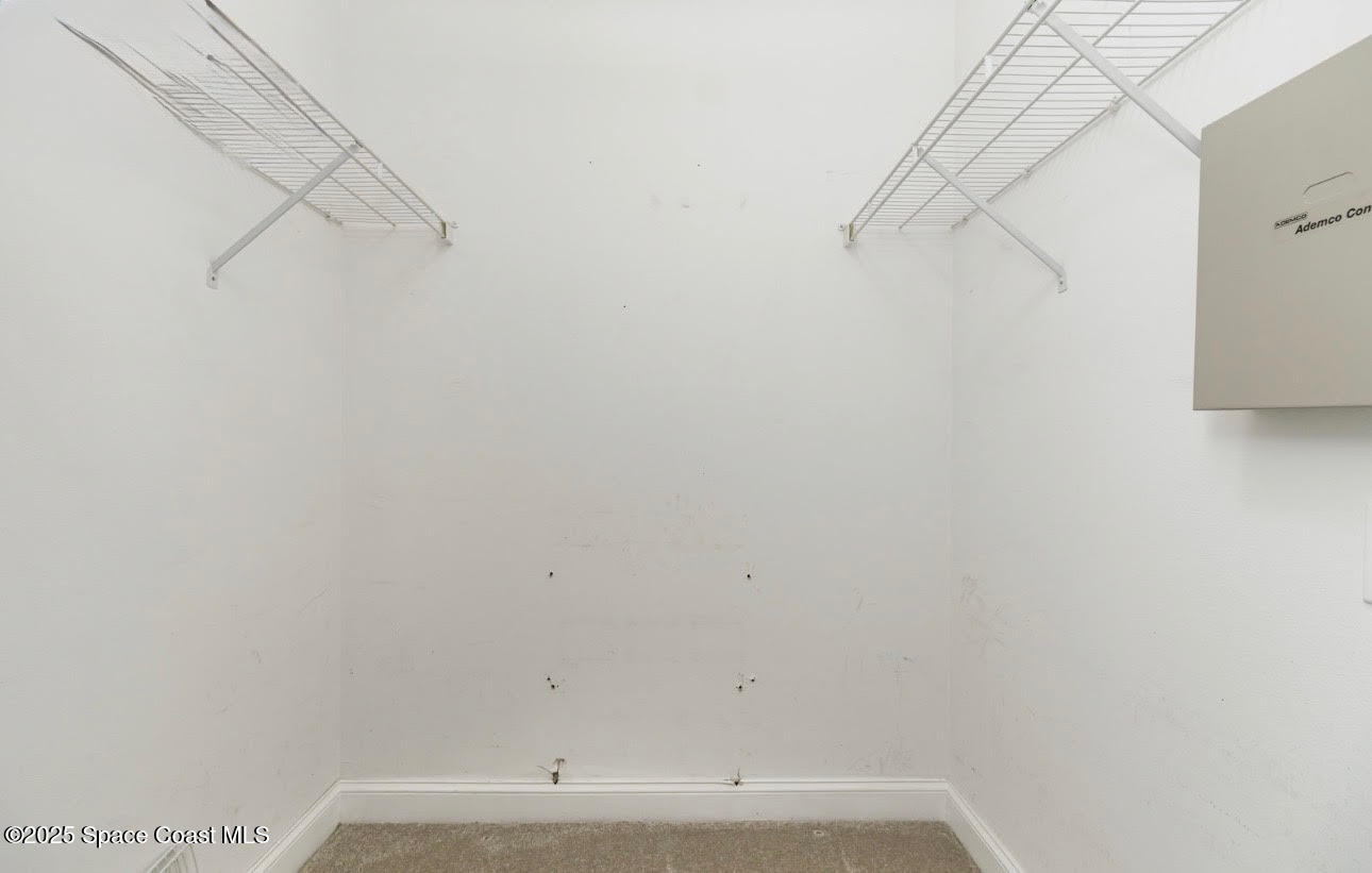 561 Carnival Terrace Sebastian, FL 32958 - Photo 12 of 28 a view of small space with racks on the wall