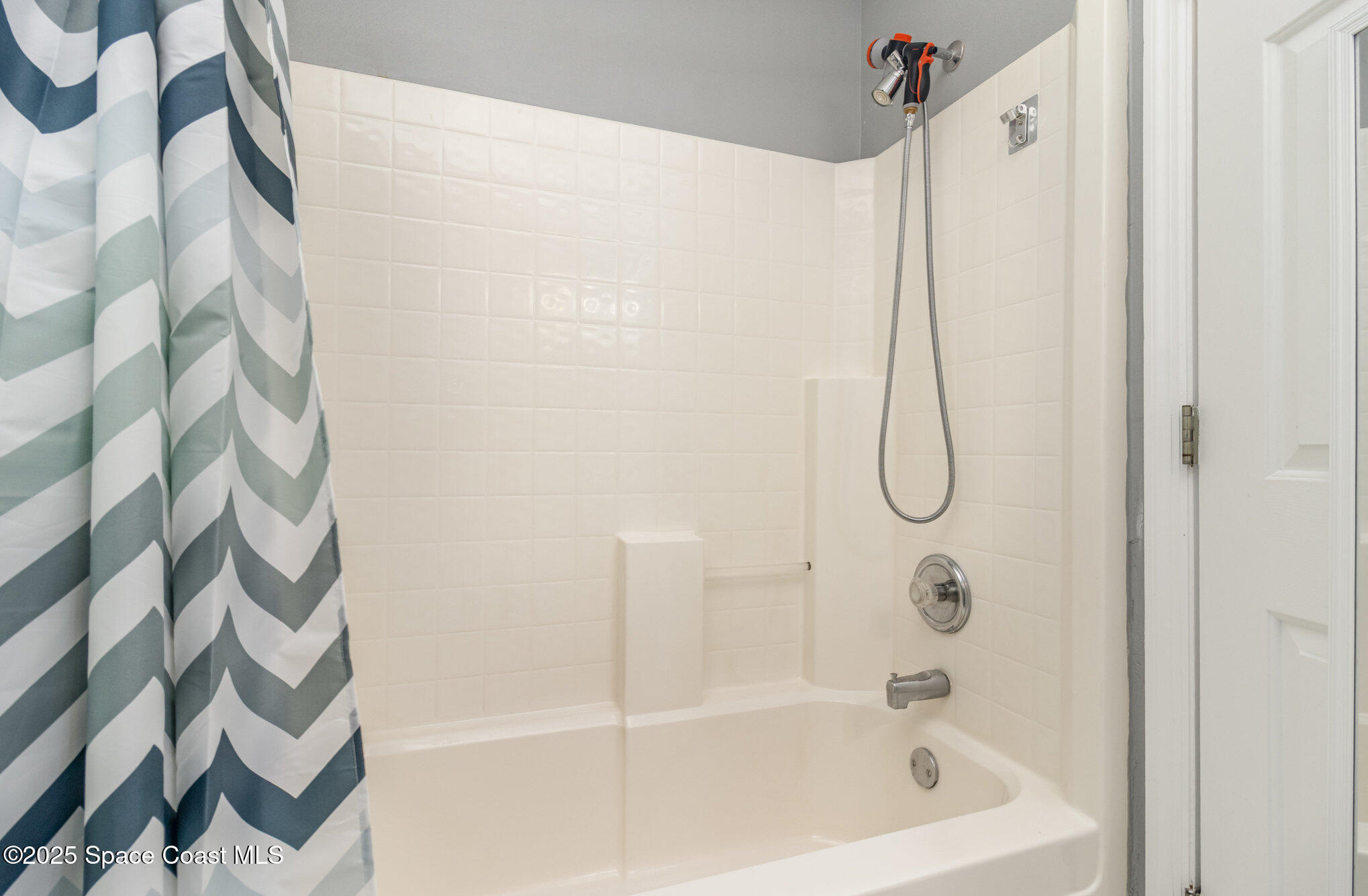 561 Carnival Terrace Sebastian, FL 32958 - Photo 17 of 28 a close up of a bathtub curtain