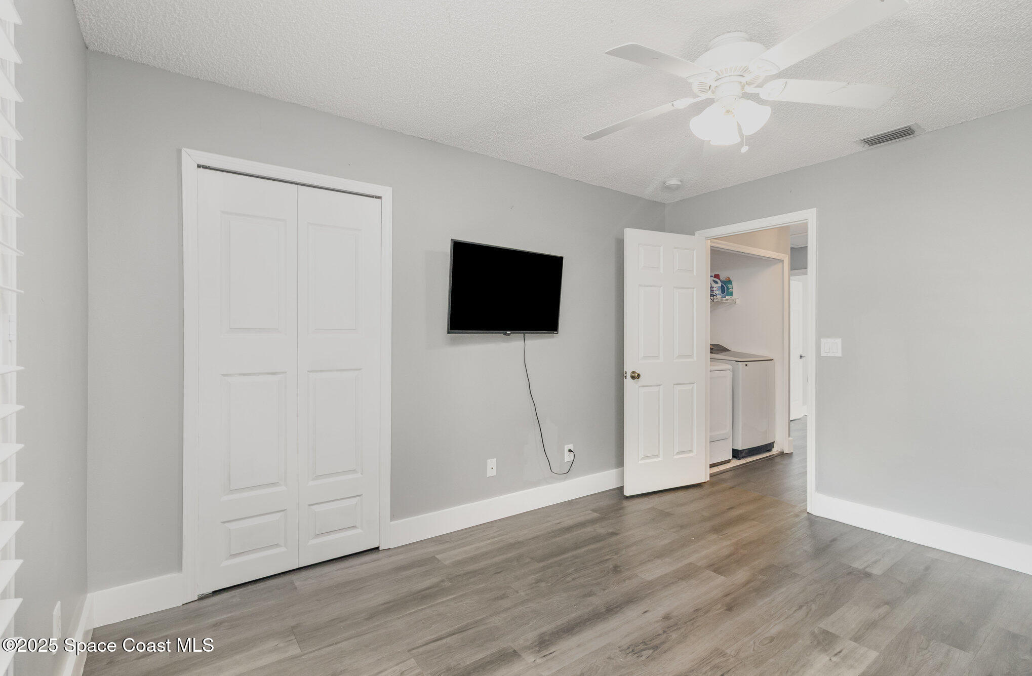 561 Carnival Terrace Sebastian, FL 32958 - Photo 20 of 28 wooden floor in an empty room