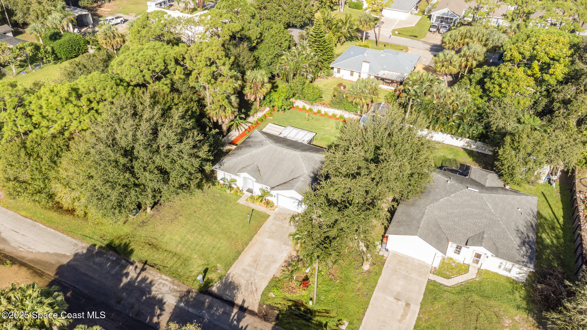 561 Carnival Terrace Sebastian, FL 32958 - Photo 4 of 28 an aerial view of a residential houses with yard