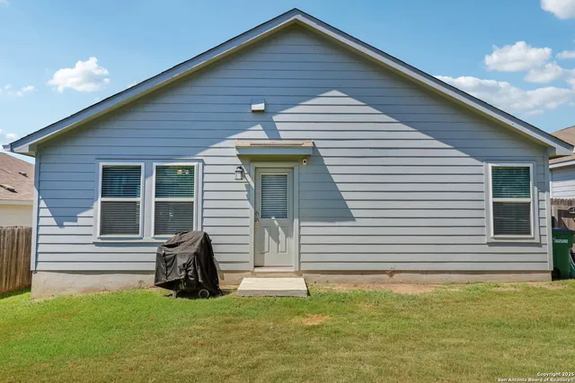 a view of a house with a patio
