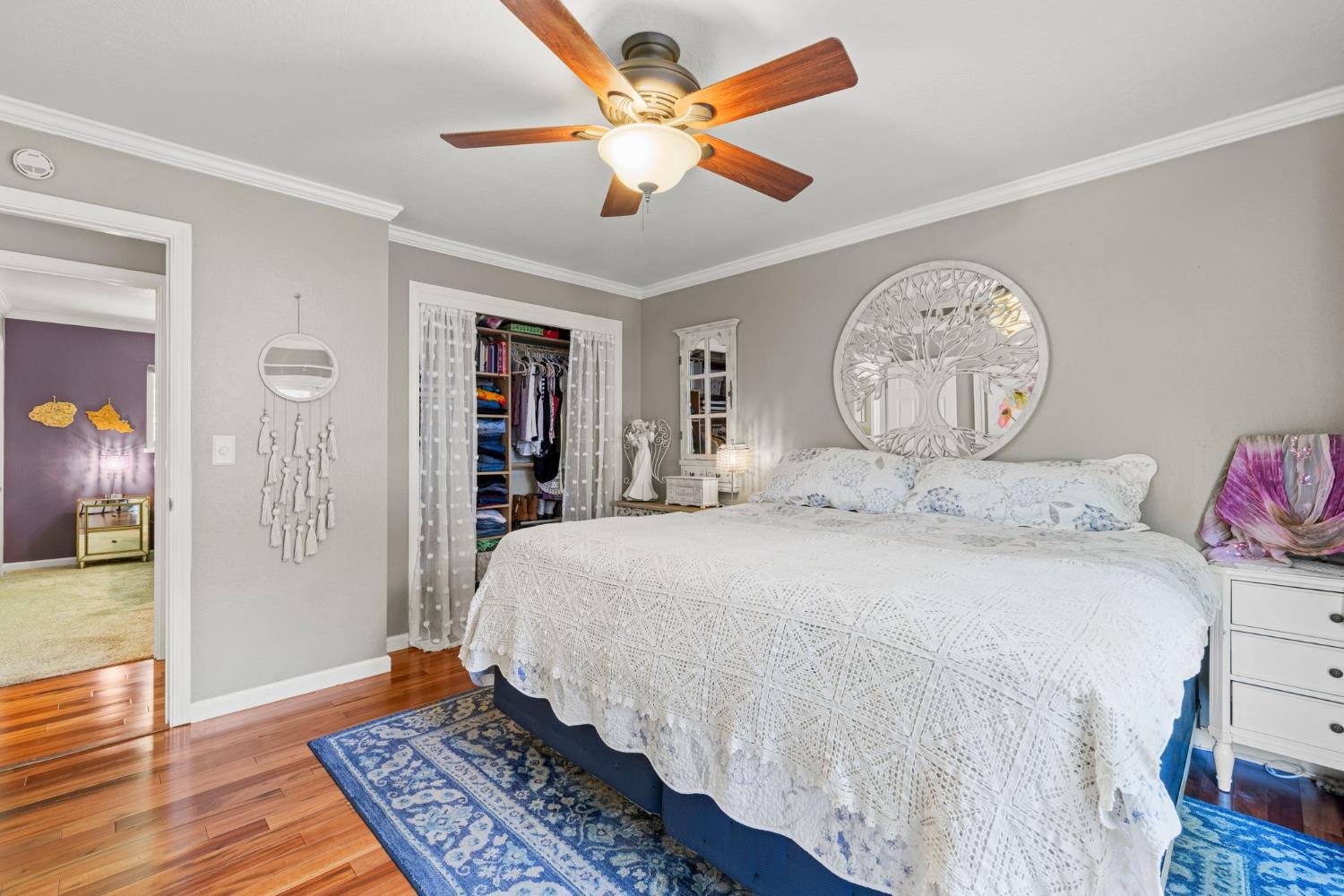 2812 Crystal Springs Road Camino, CA 95709 - Photo 16 of 28 a bedroom with a bed and a chandelier