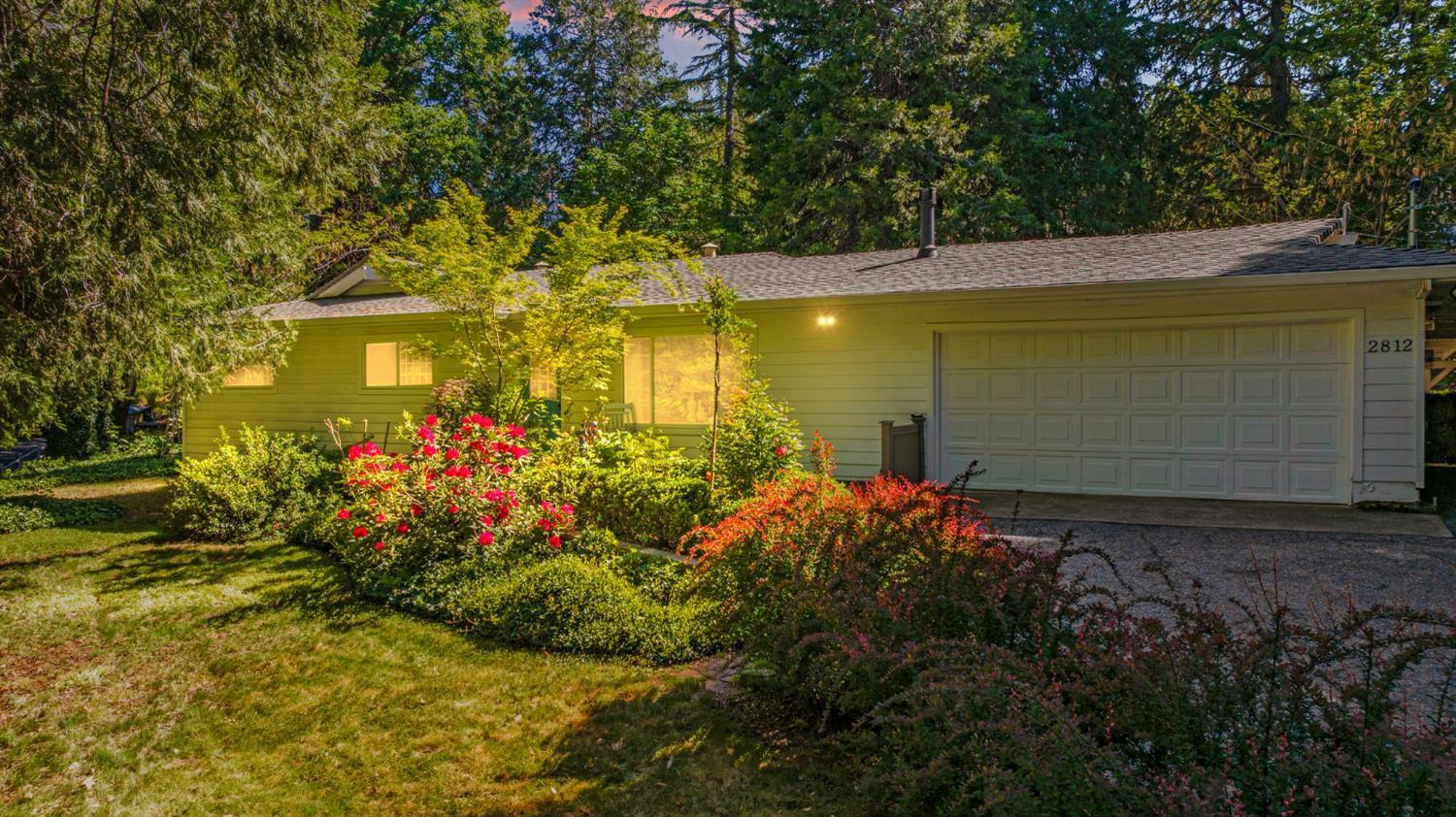 2812 Crystal Springs Road Camino, CA 95709 - Photo 2 of 28 a front view of a house with a yard