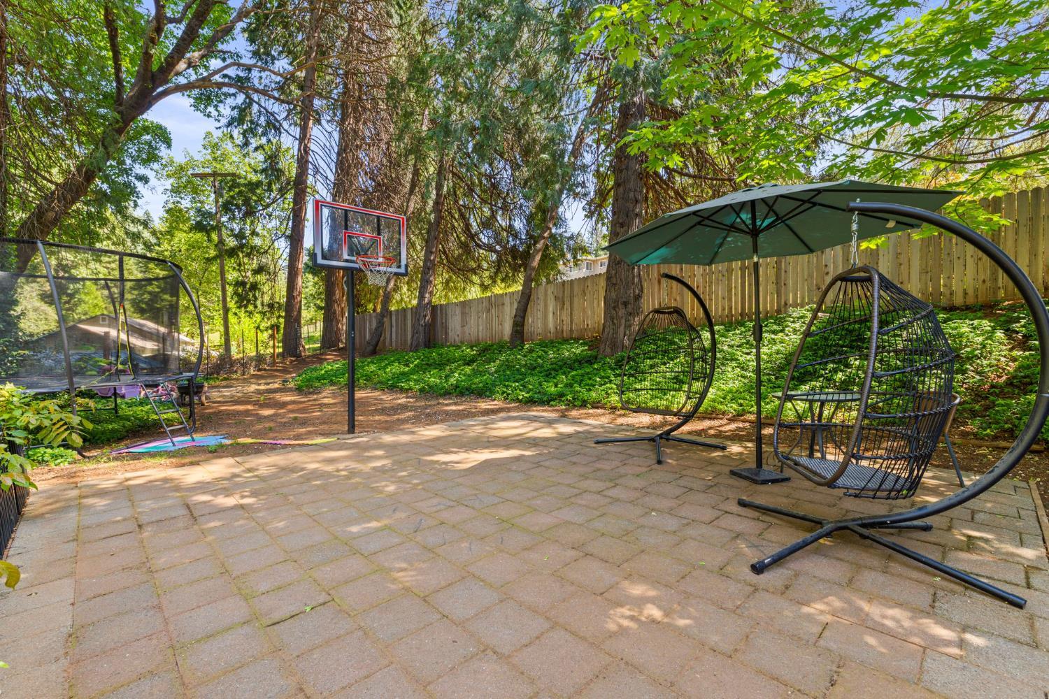 2812 Crystal Springs Road Camino, CA 95709 - Photo 27 of 28 a view of a backyard with sitting area