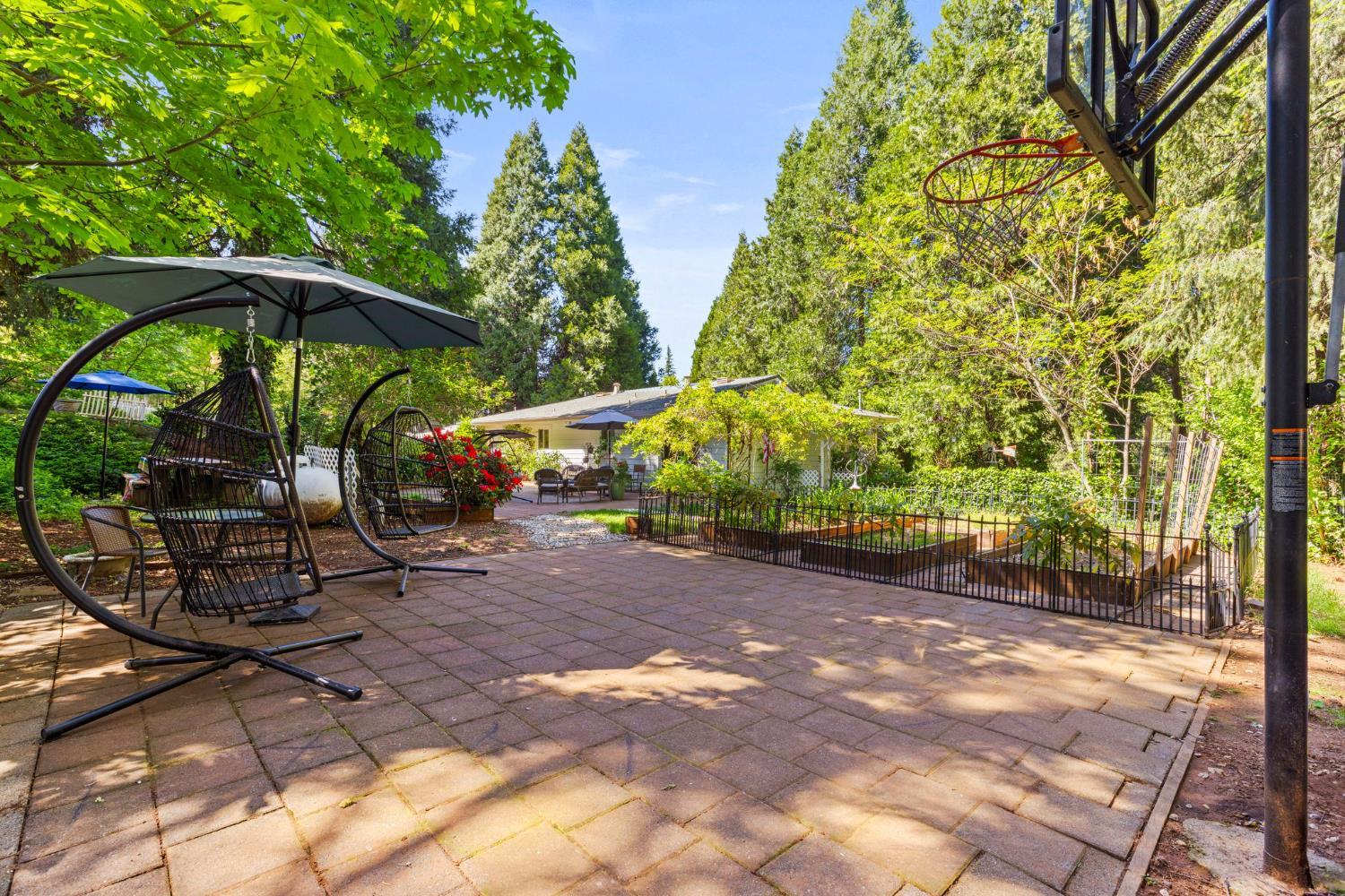 2812 Crystal Springs Road Camino, CA 95709 - Photo 28 of 28 a view of a bench in a backyard
