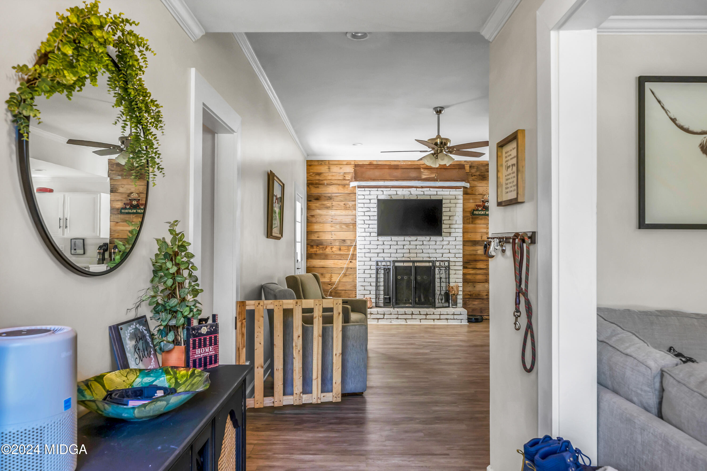 251 Buck Road Gray, GA 31032 - Photo 6 of 54 a view of living room kitchen and a wooden floor