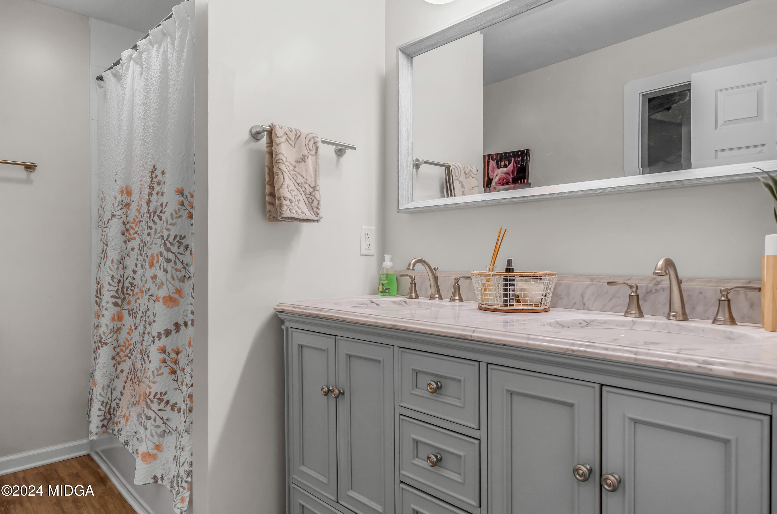 251 Buck Road Gray, GA 31032 - Photo 8 of 54 a bathroom with a granite countertop sink and a mirror