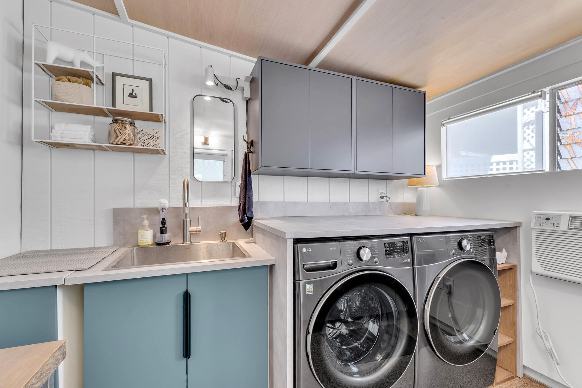 69 Nile Street Palm Springs, CA 92264 - Photo 15 of 68 a close view of a kitchen with cabinets and washer dryer