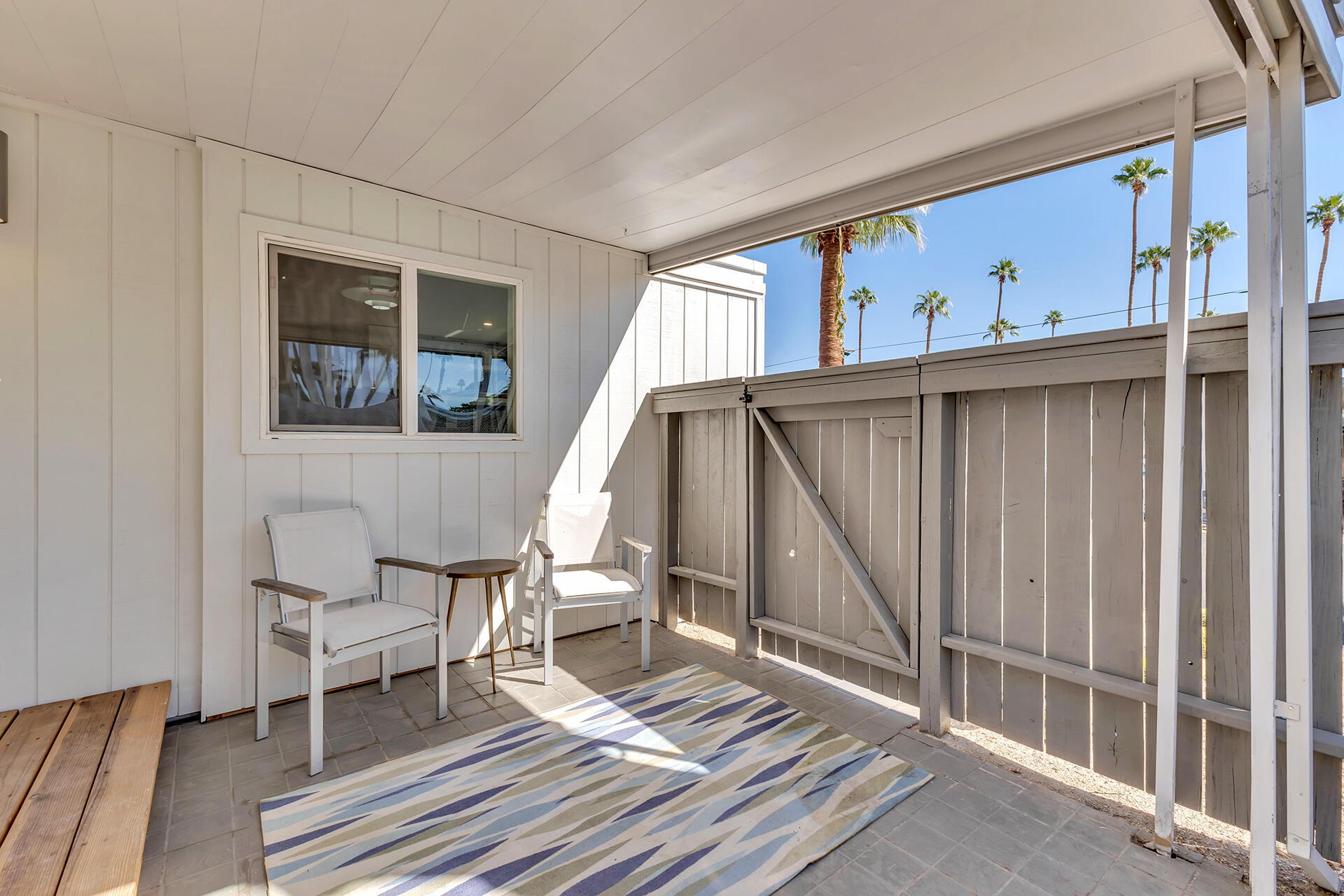 69 Nile Street Palm Springs, CA 92264 - Photo 17 of 68 a view of staircase with wooden floor and a rug
