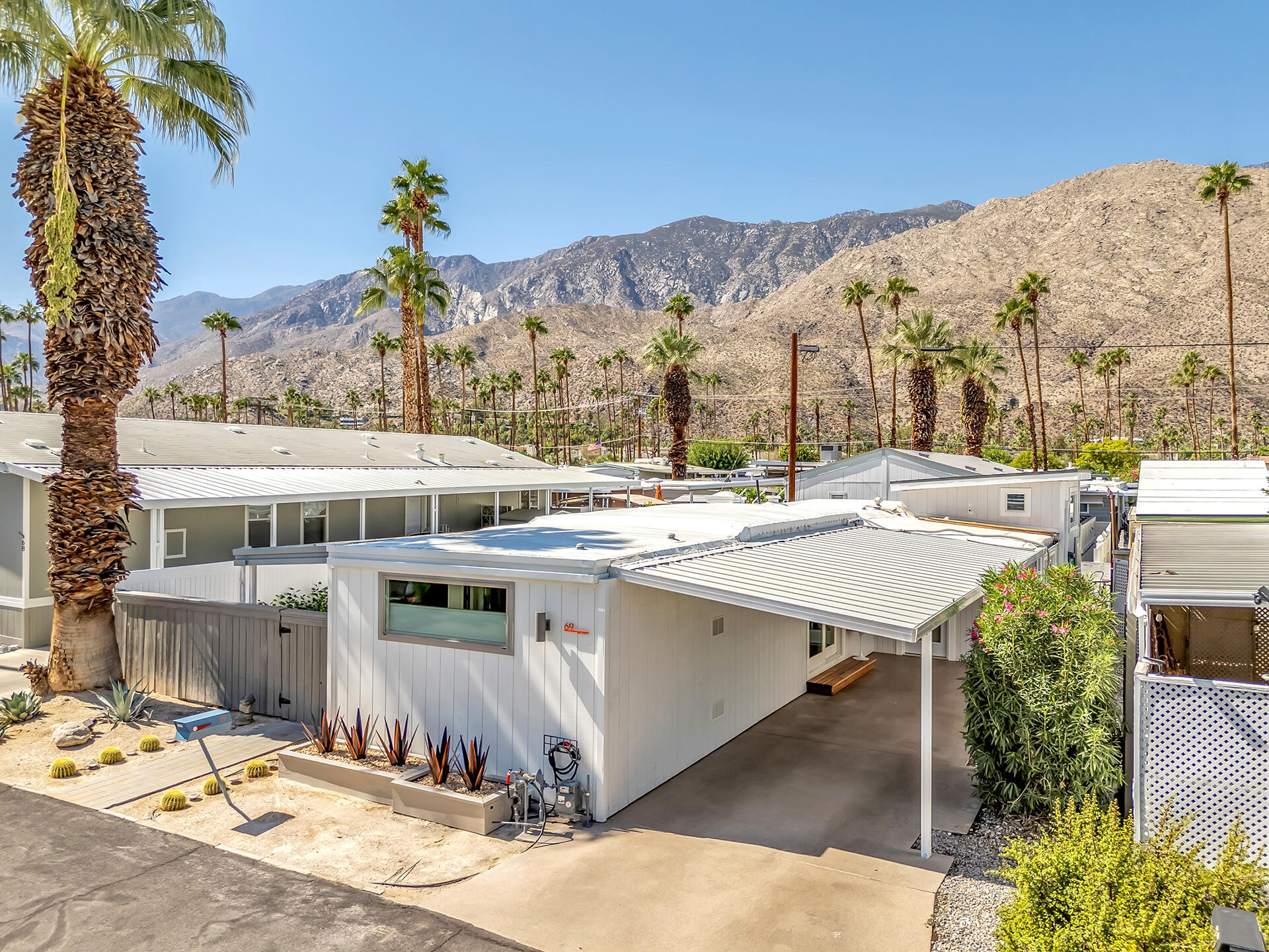 69 Nile Street Palm Springs, CA 92264 - Photo 19 of 68 aerial view of a house with a yard and furniture