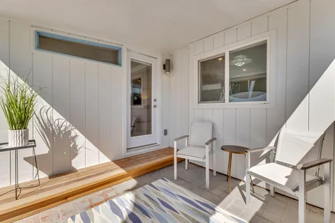 a view of a dining room kitchen with furniture and window