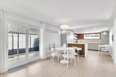 a view of a water fountain in front of a building