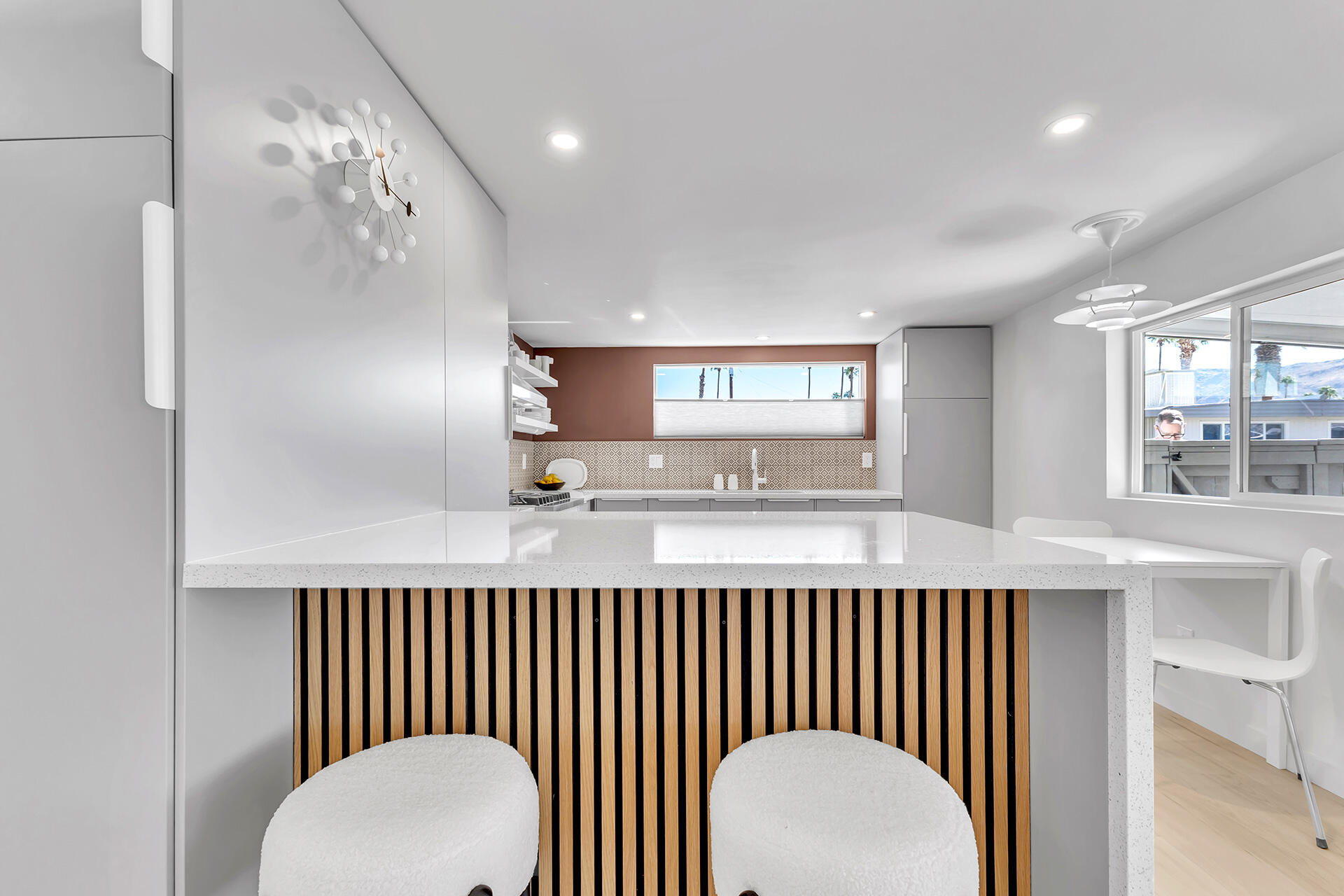 69 Nile Street Palm Springs, CA 92264 - Photo 38 of 68 a kitchen with a refrigerator a sink and dishwasher with wooden floor