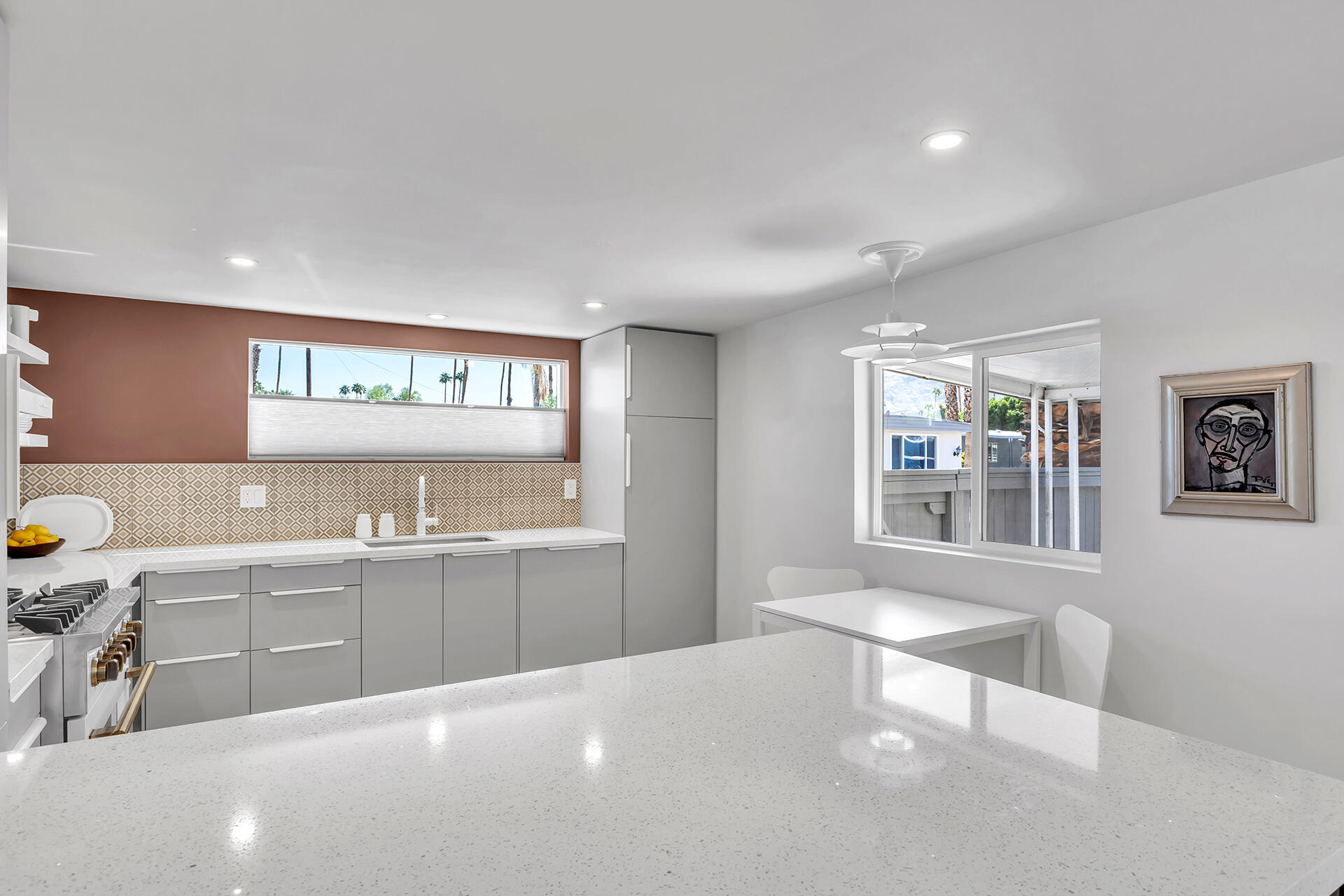 69 Nile Street Palm Springs, CA 92264 - Photo 40 of 68 a large white kitchen with a large window