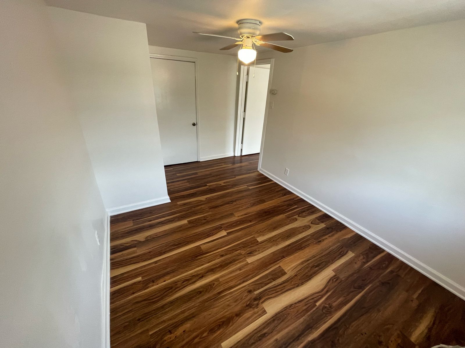 6404 Ponca Street, Unit B Austin, TX 78741 - Photo 9 of 17 a view of room with a ceiling fan