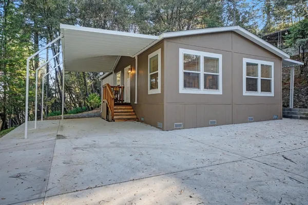 a house view with a outdoor space
