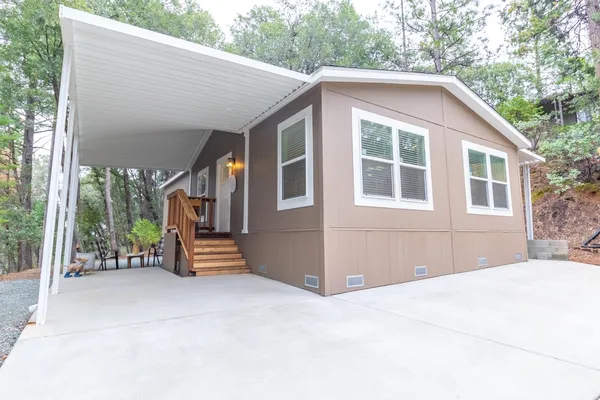 a view of a room with a large window