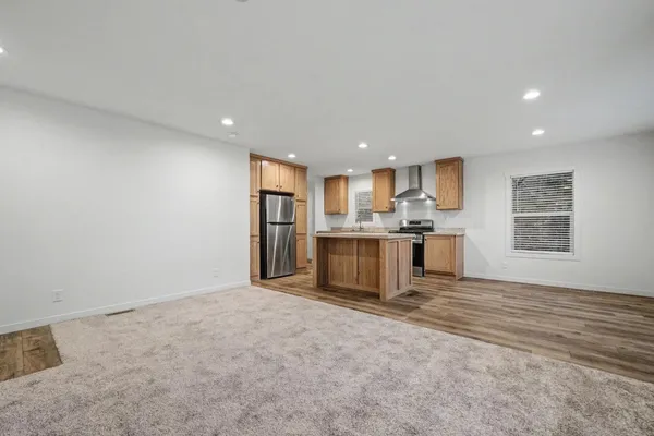 a view of a kitchen with a sink