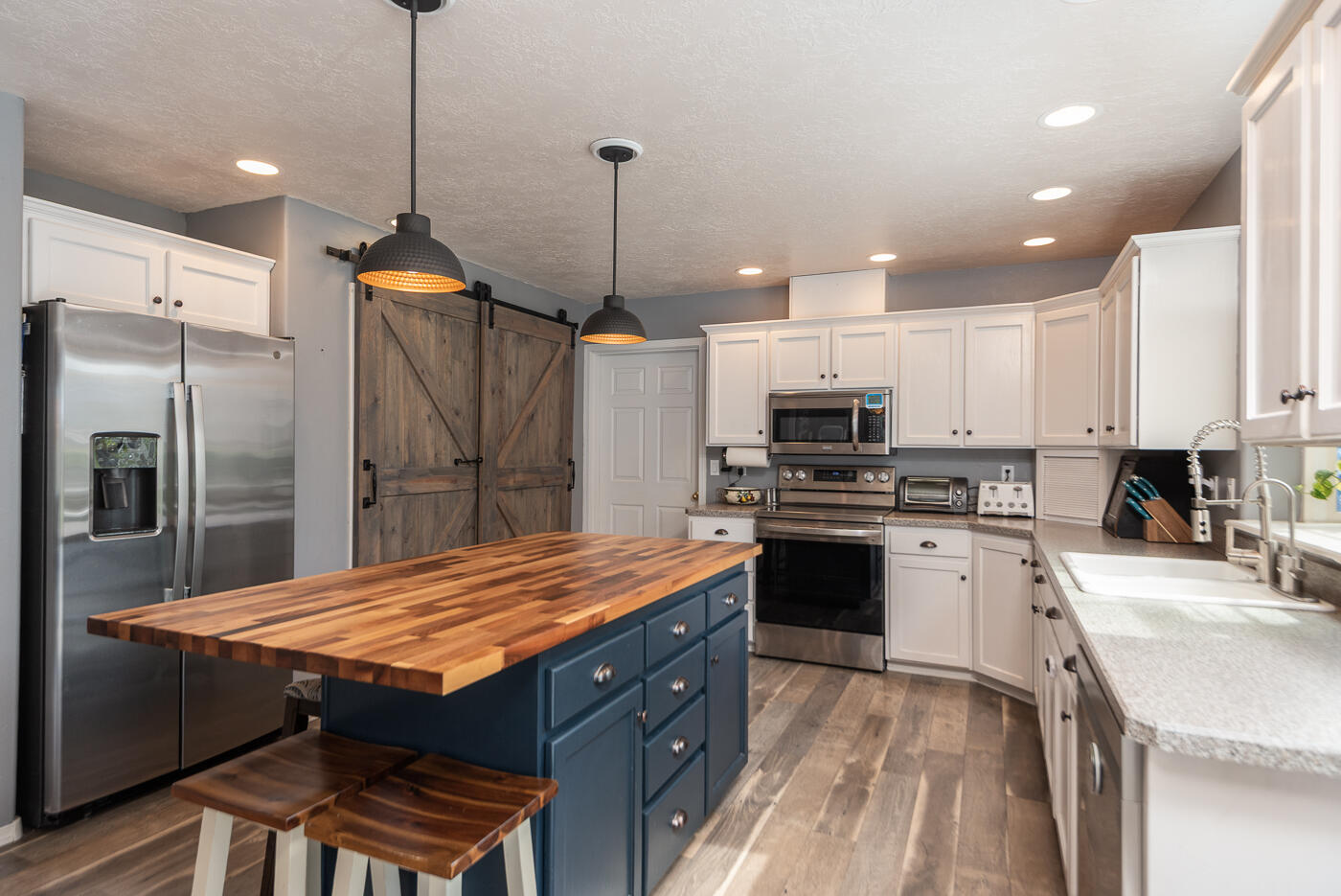905 Southwest Burns Lane Madras, OR 97741 - Photo 20 of 46 Butcher block island with kitchen storage