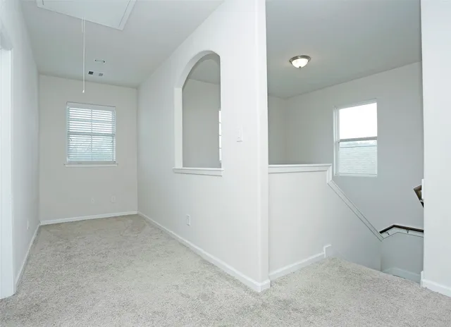 an empty room with windows