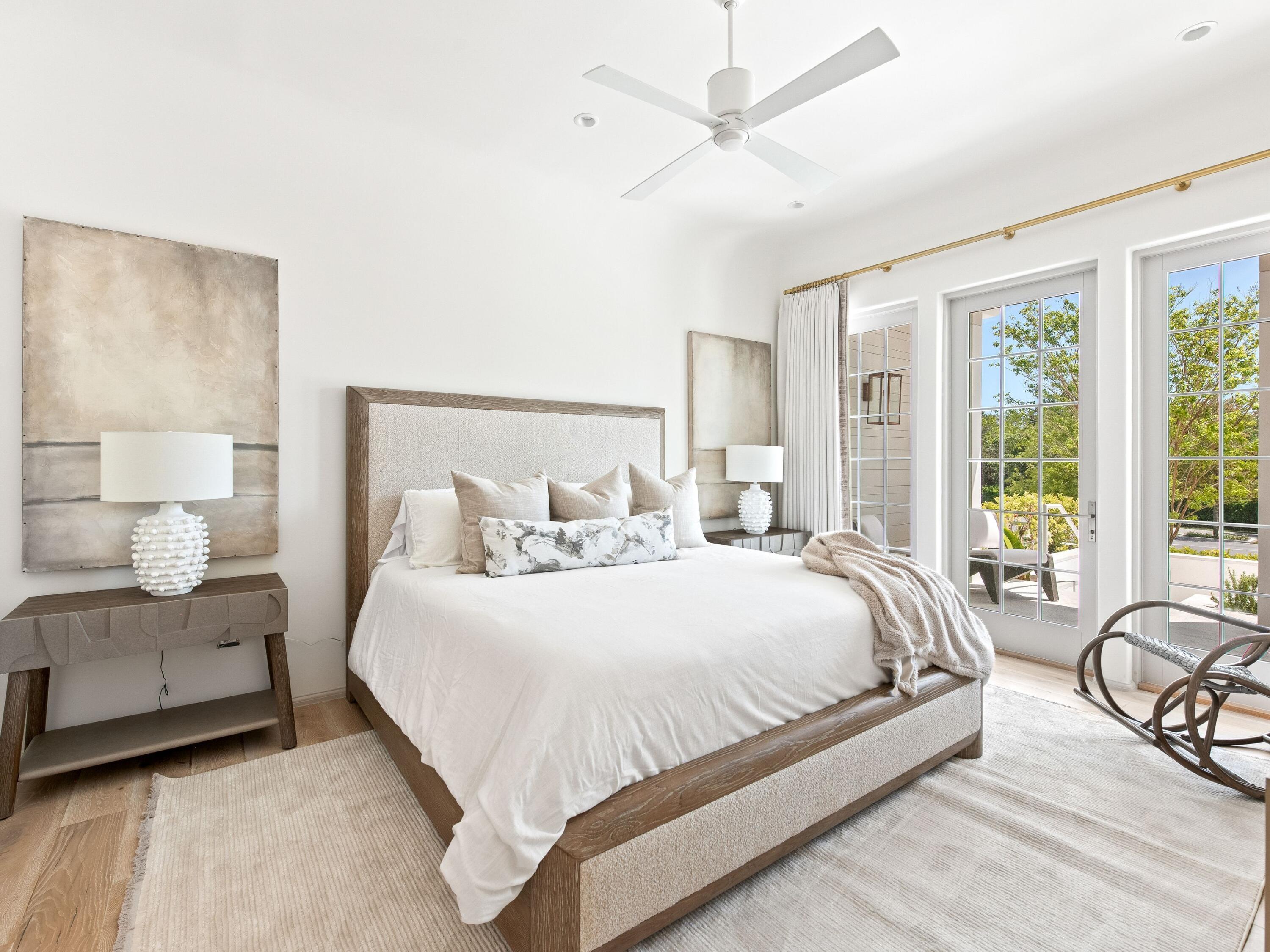 45 West Solaire Way Inlet Beach, Unit 103 Inlet Beach, FL 32461 - Photo 12 of 25 a bedroom with a bed and large mirror