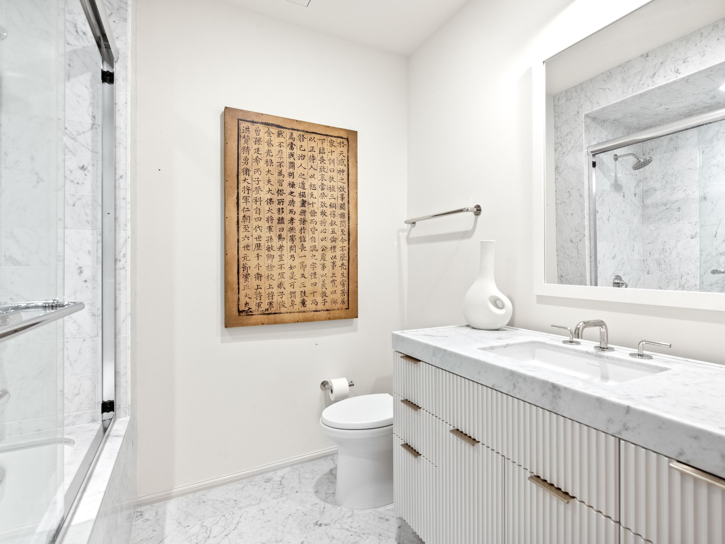 45 West Solaire Way Inlet Beach, Unit 103 Inlet Beach, FL 32461 - Photo 17 of 25 a bathroom with a granite countertop sink toilet a large mirror and shower